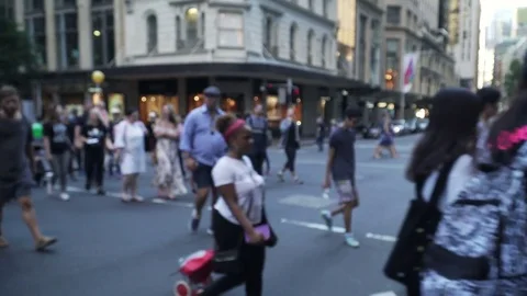 Unrecognized crowd walking in busy shopping street Stock Footage 84210175