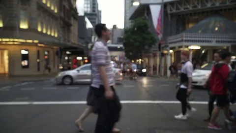 Unrecognized crowd walking in busy shopping street Stock Footage 84229148