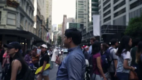 Unrecognized crowd walking in busy shopping street Stock Footage 84233152