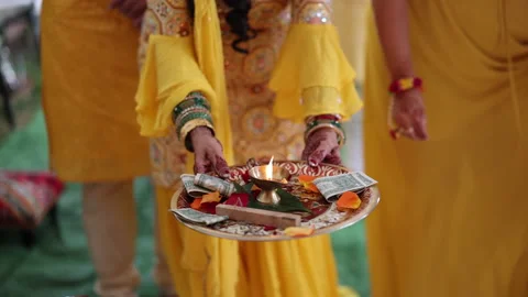 Unrecognized people in traditional clothes collecting donations for a ritual Stock Footage 238635510