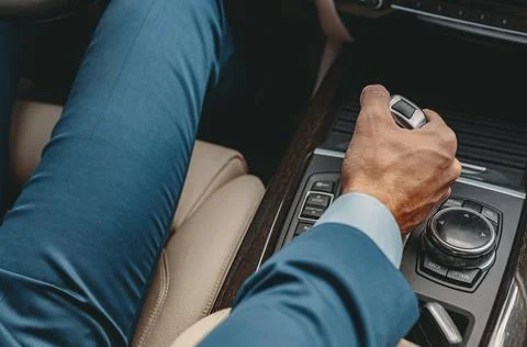 Unrecognized person is holding variable speed drive Foto stock
