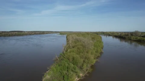 Unregulated Vistula river in Poland (Central Europe) with a wild island - drone Stock Footage 271298677
