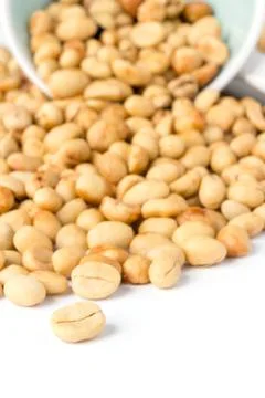 Unroasted coffee beans Stock Photos