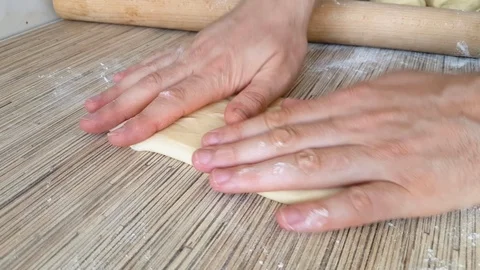 Unrolling dough with rolling pin Stock Footage 126326164