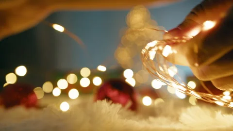Unrolling LED lights for Christmas decorations Stock Footage 320290854