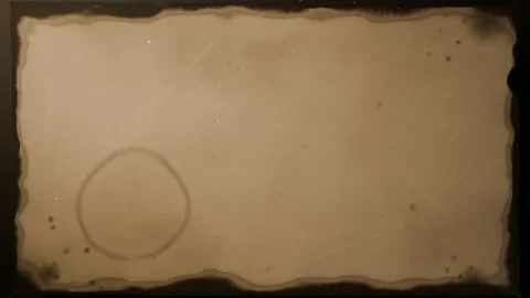 Unrolling scroll revealing aged parchment at studio backdrop, showing ring Stock Footage 340268248