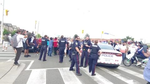 Unruly crowd of BLM protesters tell cops to back off from their demonstration Stock Footage 133975229