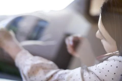 Unsafe driving. Talking on the Phone While Driving Stock Photos