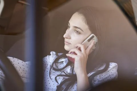 Unsafe driving. Talking on the Phone While Driving Stock Photos