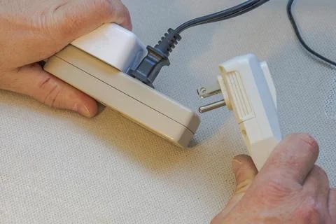 Unsafe Electrical Extension Plug Connection Stock Photos