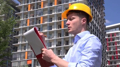 Unsatisfied uncertain architect male developer drawing real estate construction Stock Footage