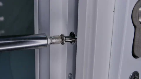 Unscrew door lock Stock Footage 145758117