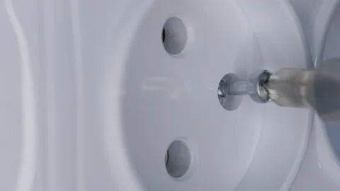 Unscrew electrical plug Stock Footage 145758147