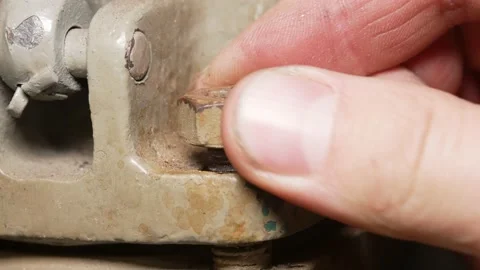 Unscrewing the nut Stock Footage 169835498