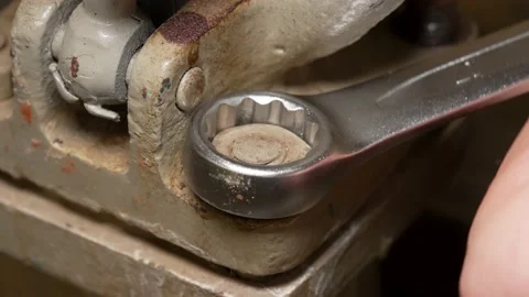 Unscrewing the nut Stock Footage 169835641