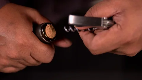 Unscrewing a Wine Cork Video stock 122483003