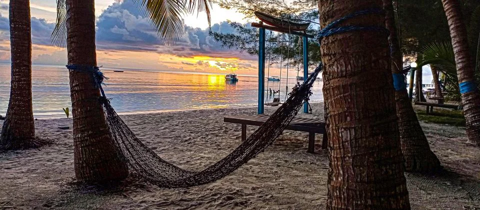 Unset on the beach Stock Photos