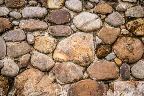 Unshaped stone wall background Stock Photos
