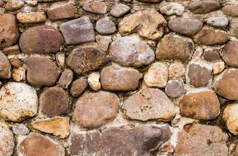 Unshaped stone wall background Stock Photos