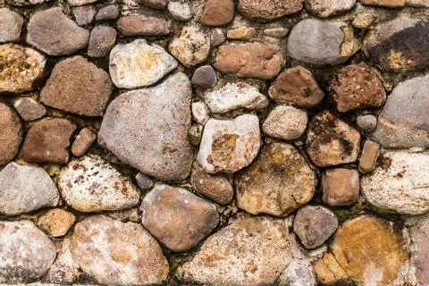Unshaped stone wall background Stock Photos