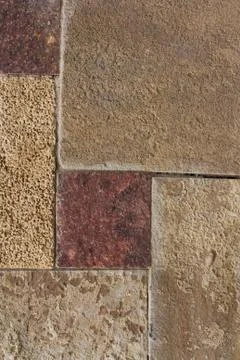 Unshaped stone wall pattern,wall made of rocks Stock Photos