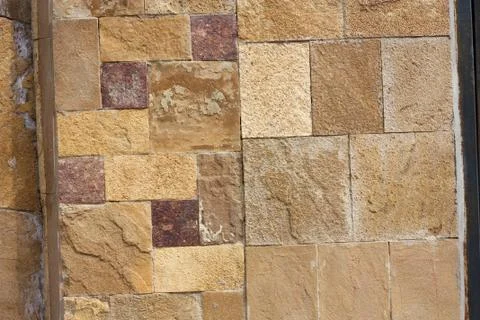 Unshaped stone wall pattern,wall made of rocks Stock Photos