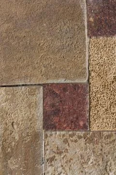 Unshaped stone wall pattern,wall made of rocks Stock Photos