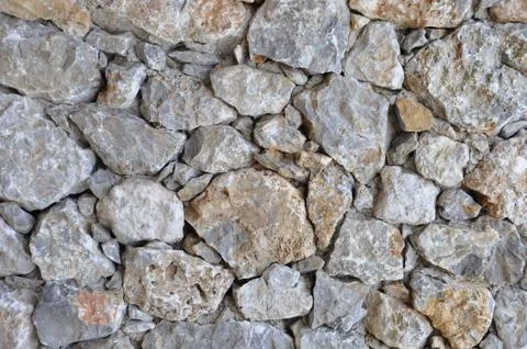 Unshaped stone wall Stock Photos