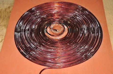 Unshielded copper wire wound to form a disc Stock Photos