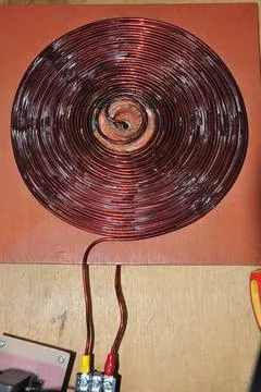 Unshielded copper wire wound to form a disc Stock Photos