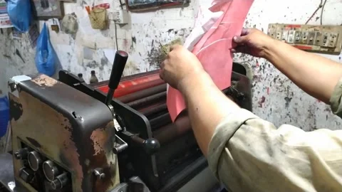 Unskilled man using Industrial Printer Machine Stock Footage 194643562