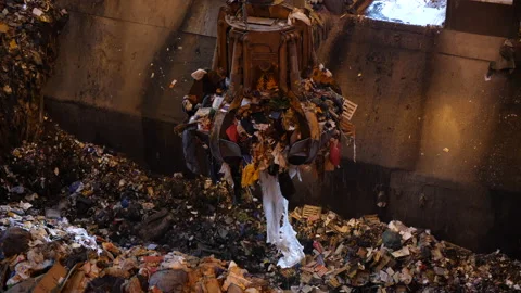 Unsorted garbage is collected by a special crane claw for incineration factory. Video stock 234677468