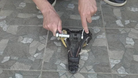 Unspin an old bicycle saddle Video stock 313790459