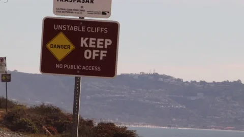 Unstable cliffs stay back sign overlooking la jolla Stock Footage 221381383