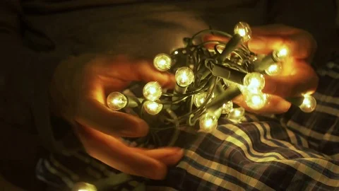 Untangling Christmas Lights Video stock 69825023