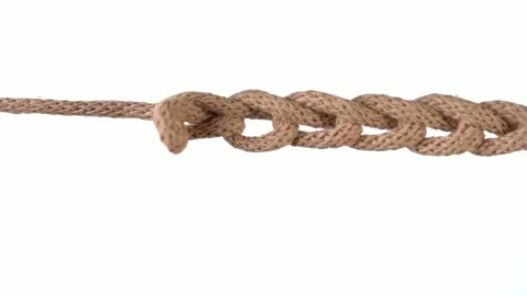 Untangling uncoupling knitted loops close up slow motion. Stock Footage 237812139