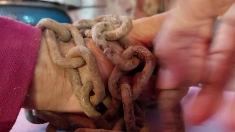 Untie the chain from your hand Stock Footage 262028337