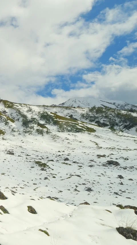 Untouched Snowfields and Rugged Mountain Cliff in Winter Light near Rauheck i Stock Footage 308878673
