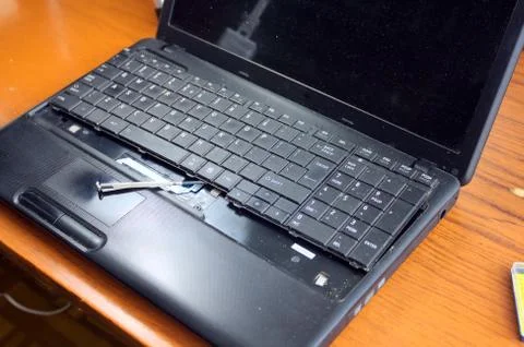 Untwisting of laptop Stock Photos