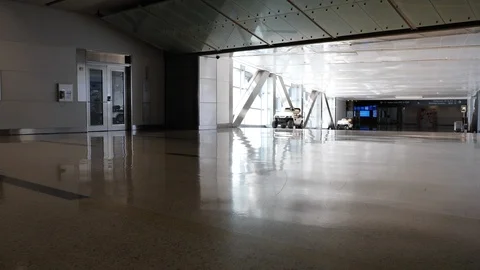 Unused carts at empty airport Stock Footage 129345183