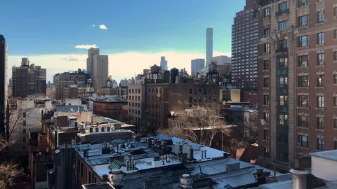 Unusual angle of layered and interweaving New York City Rooftops. Video stock 126129346