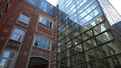 Unusual brick building with panoramic large windows. bottom view. glass brick Vídeos de archivo 164930266
