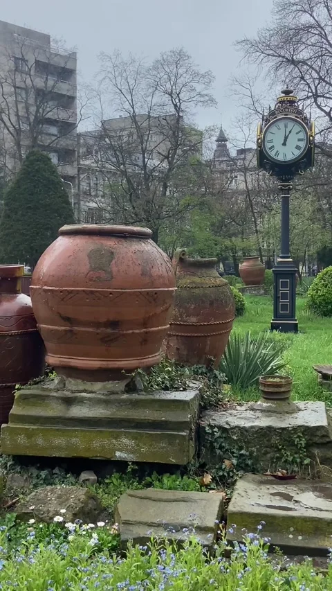An unusual clock is in the beautiful park. Spring. Stock Footage 237723113