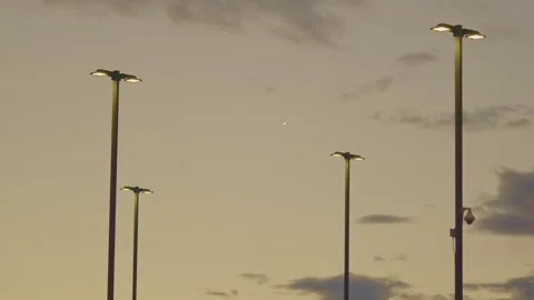 Unusual cloud on the background of parking lots at sunset Stock Footage 259443672