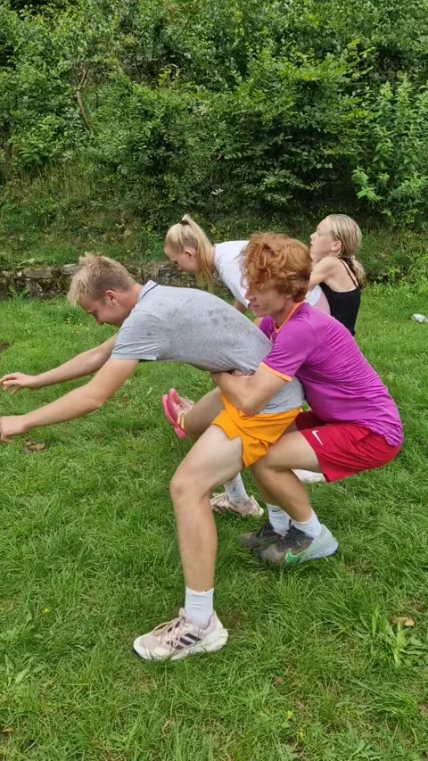 Unusual Exercise Game Requires Teamwork, Eisenach, Germany - 17 Aug 2023 Stock Footage 249882836