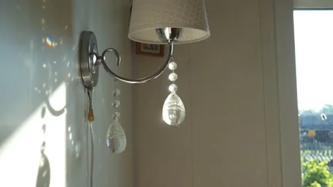 Unusual glare from a regular lamp Stock Footage 162390192