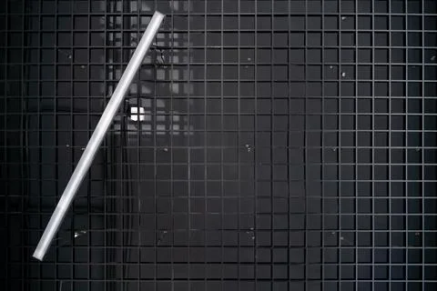 Unusual rectangular design lamps on the ceiling in an expensive restaurant. I Stock Photos