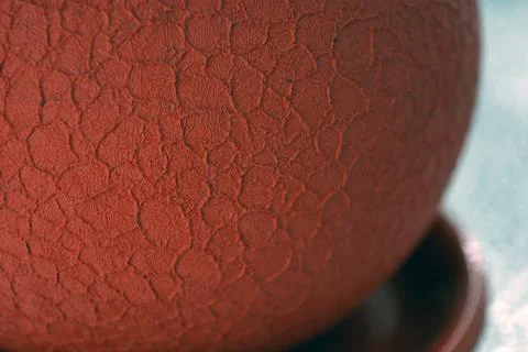 Unusual red structural background with graphic consecurs, made of clay. Stock Photos