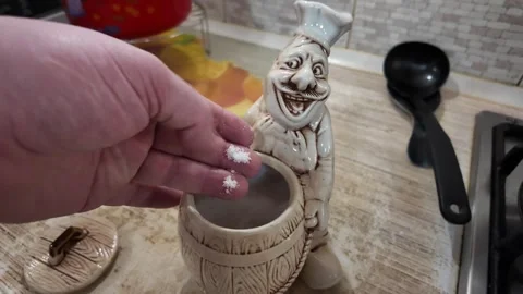 Unusual salt shaker in the form of a chef. salt shaker in the kitchen. salt.. Stock Footage 299896087