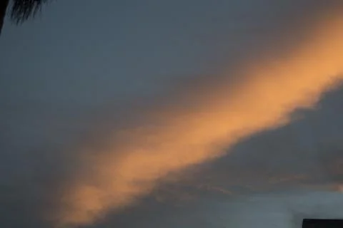 Unusual sunset and cloud light Stock Photos